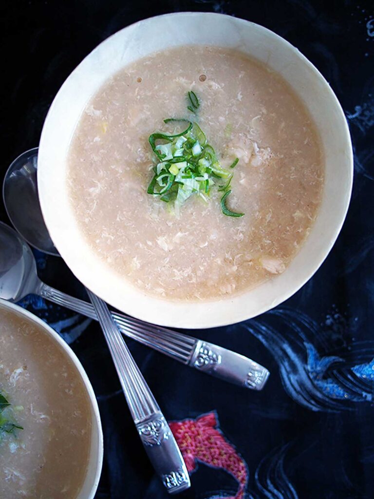japanese rice soup in a bowl with spoons