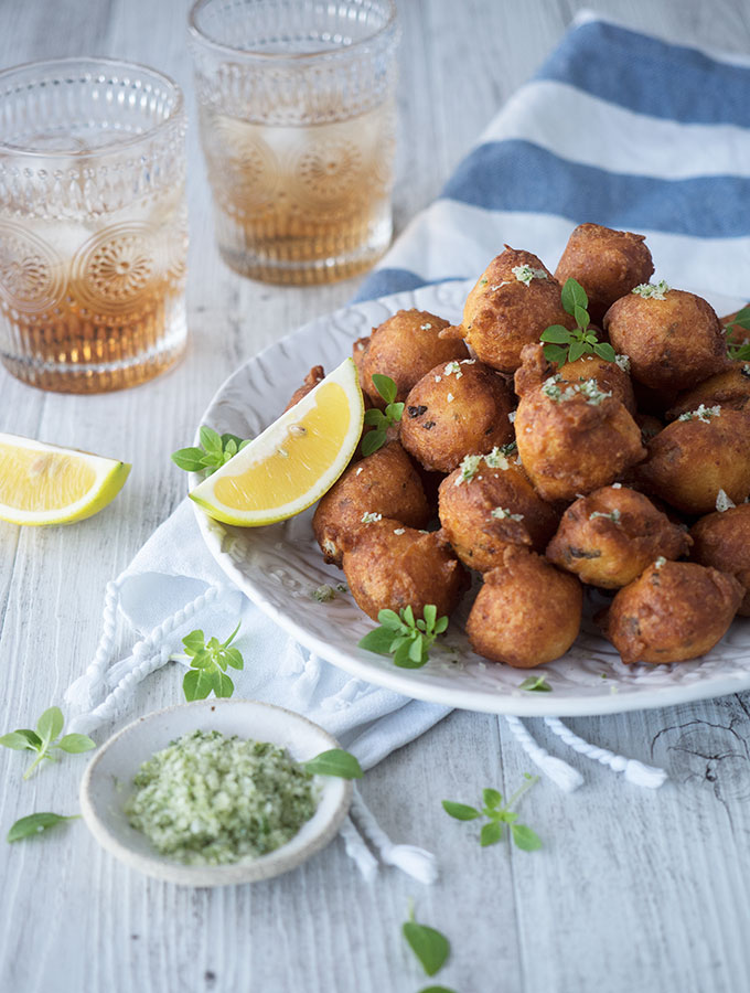 Cauliflower feta balls, sensational fried mouthfuls that you wont be able to stop popping. Served with lemon wedges and oregano salt.