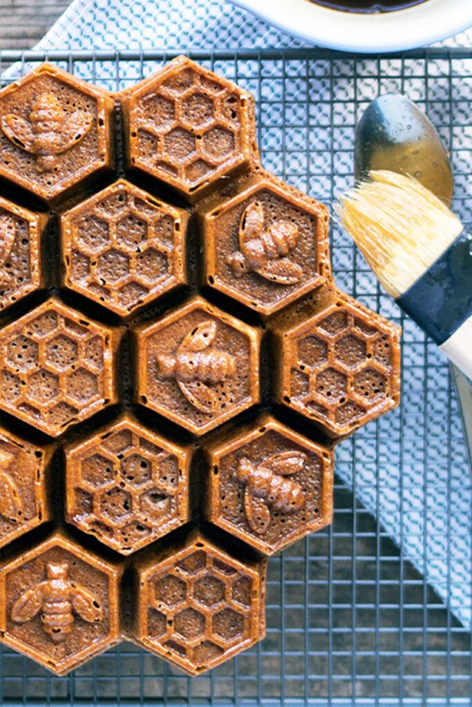 honey coffee cake with a honeycomb pattern on a cooling rack