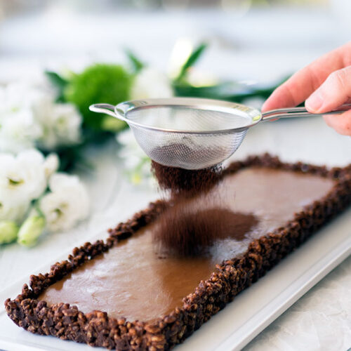 Caramel Chocolate Crackle Tart Recipe: Childhood party favourite is given a dose of adulthood with the addition of rich French Caramel to create the most decadent dessert.