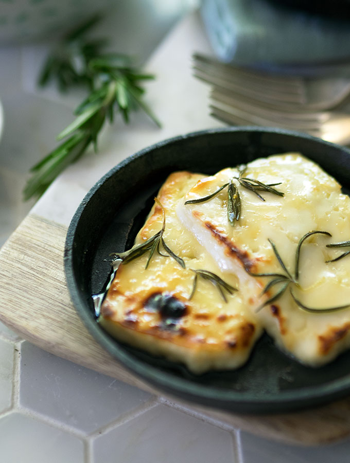 Grilled Halloumi with Honey and Rosemary - a simple dish to prepare and grill. The honey and rosemary enhances the halloumi brilliantly. This recipe is perfect with a crisp green salad.
