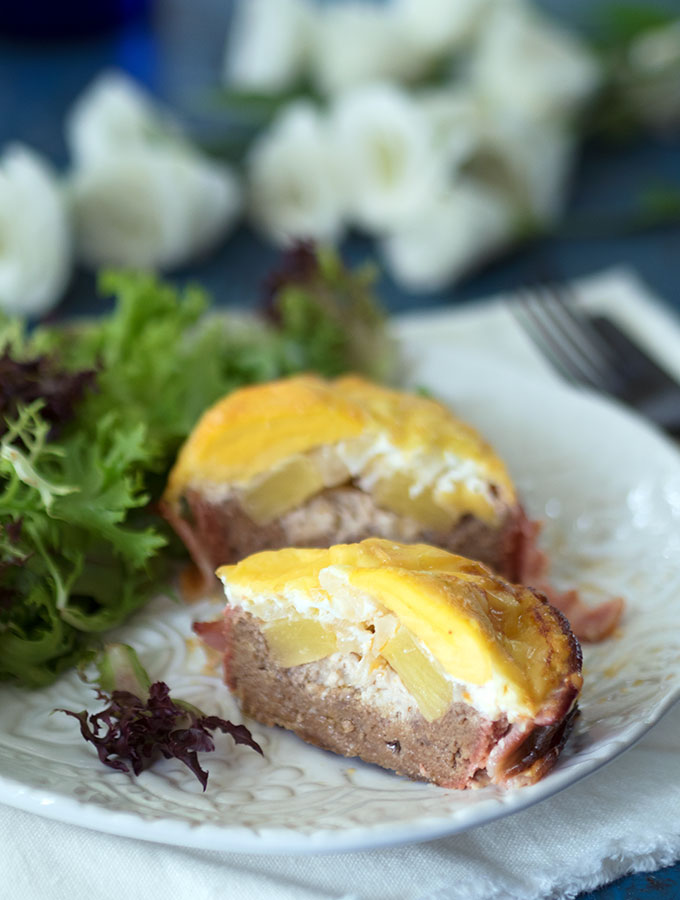 Baked Beer Can Burgers, stuffed with onion, pineapple and egg then wrapped in bacon. Simply delicious, serve with salad or on a bun.