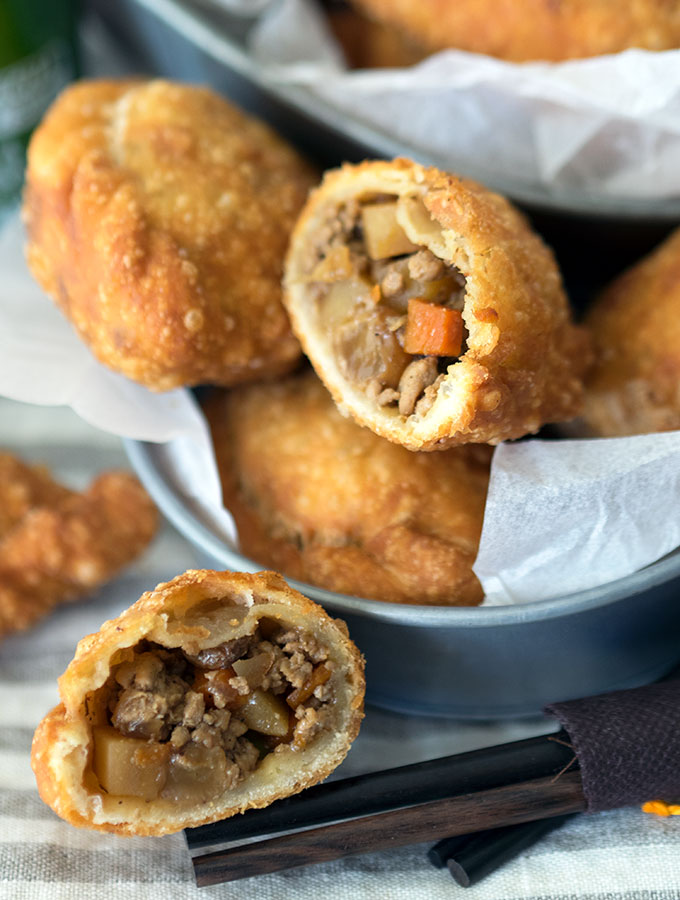 Filipino empanadas, full of flavour with flaky light pastry using a secret ingredient. Perfect Filipino snack food and you can freeze the leftovers for another day.