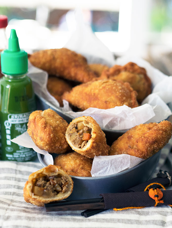 Filipino empanadas, full of flavour with flaky light pastry using a secret ingredient. Perfect Filipino snack food and you can freeze the leftovers for another day.