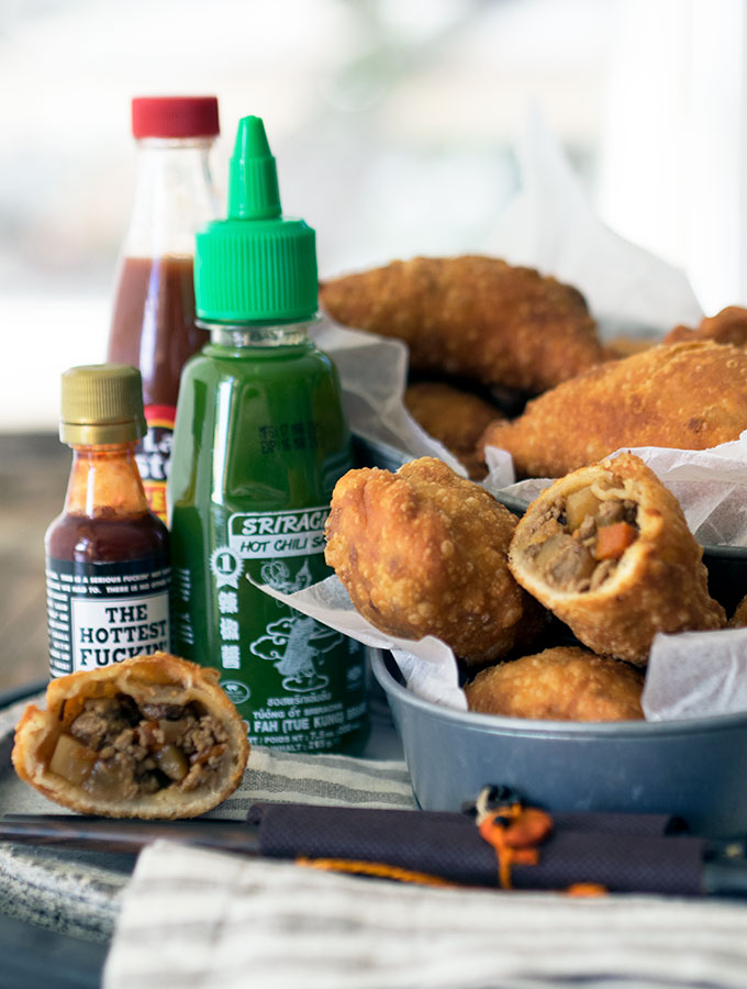 Filipino empanadas, full of flavour with flaky light pastry using a secret ingredient. Perfect Filipino snack food and you can freeze the leftovers for another day.