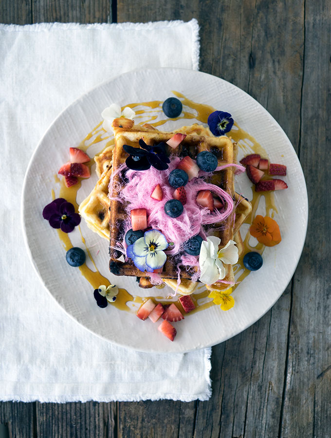 Blueberry White Chocolate Waffles, the pop of fresh blueberries and surprise of white chocolate make these waffles a breakfast winner.