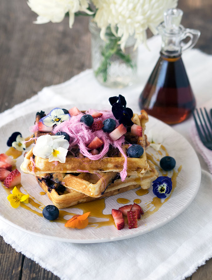 Blueberry White Chocolate Waffles, the pop of fresh blueberries and surprise of white chocolate make these waffles a breakfast winner.