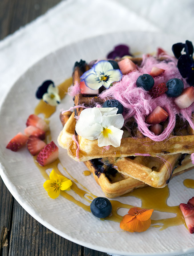 Blueberry White Chocolate Waffles, the pop of fresh blueberries and surprise of white chocolate make these waffles a breakfast winner.