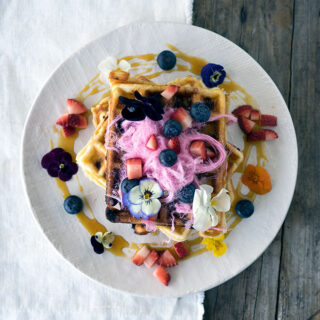 Blueberry White Chocolate Waffles, the pop of fresh blueberries and surprise of white chocolate make these waffles a breakfast winner.