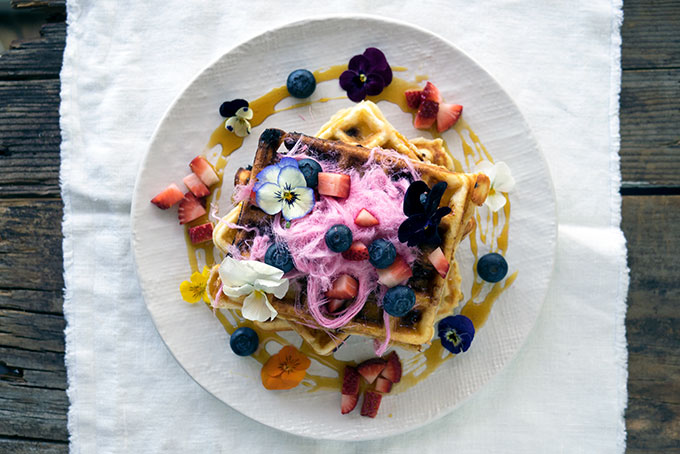 Blueberry White Chocolate Waffles, the pop of fresh blueberries and surprise of white chocolate make these waffles a breakfast winner.