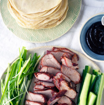 Authentic Mandarin Pancakes that are easy to make at home. Perfect to wrap up slices of Peking duck or BBQ Pork with green onions, cucumber and hoisin sauce.