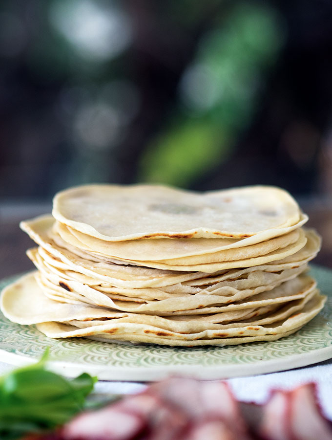 Authentic Mandarin Pancakes that are easy to make at home. Perfect to wrap up slices of Peking duck or BBQ Pork with green onions, cucumber and hoisin sauce.