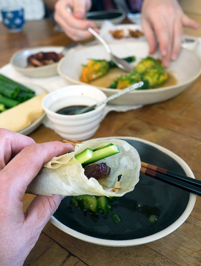 Chinese style steamed stuffed zucchini flowers part of a yum cha spread