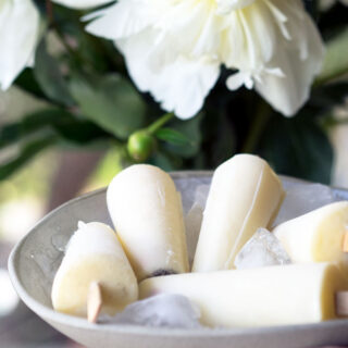 Vanilla Milk Ices are the lighter, easier alternative to making ice cream popsicles. Only three ingredients, no churning required and they are egg free.