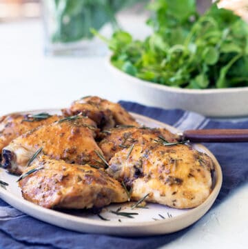 Simple to prepare oven baked skinless chicken thigh cutlets, with sticky maple, garlic and rosemary glaze. Simply Delicious mid week family fare.