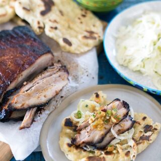 BBQ Smoked Pork Belly, Apple Fennel Slaw and Easy BBQ Flat Breads. Slow BBQ fall apart pork belly with zingy slaw and easy 3 ingredient flat breads.