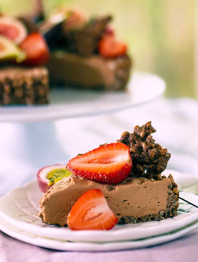 Chocolate cheesecake topped with lush berries, figs and passionfruit