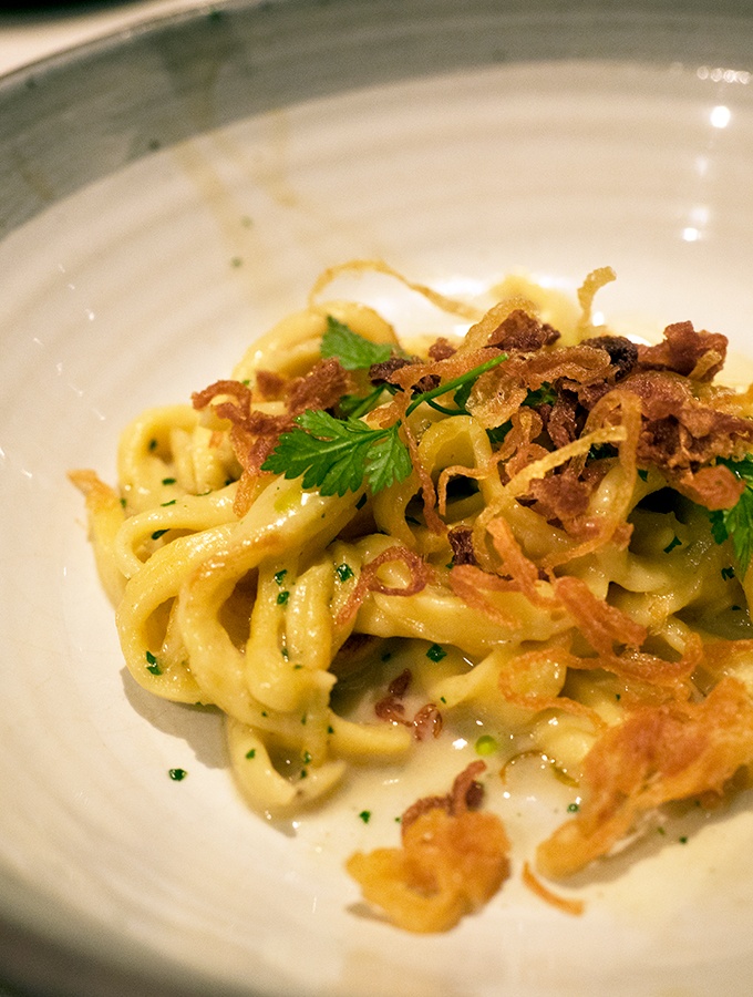 Suhring Restaurant Bangkok Thailand Spztzle with Crispy Fried Onion scattered on top at the table