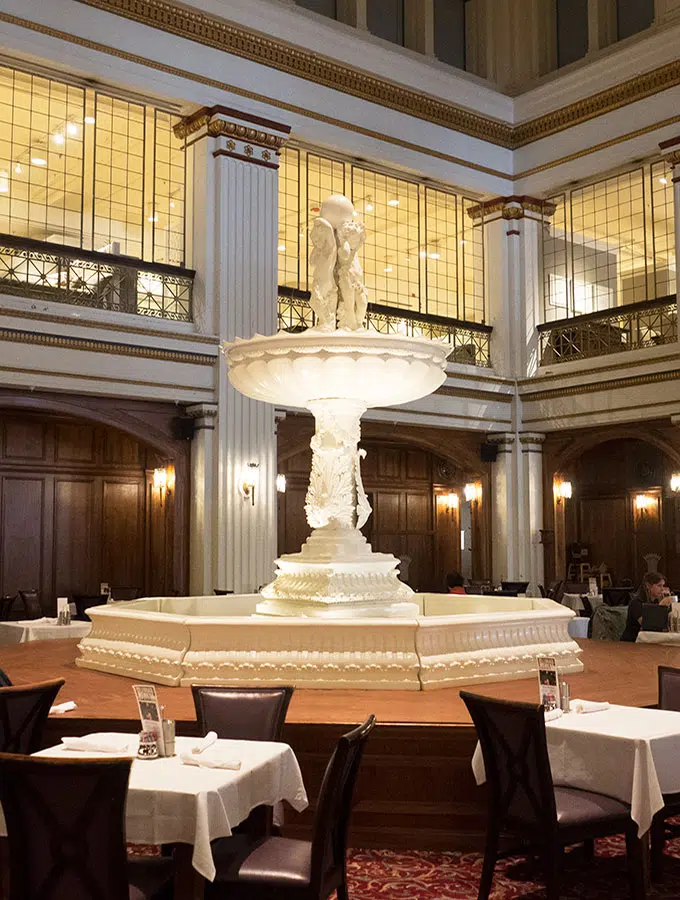 Macy's Walnut Room 17-foot marble fountain, which gets covered by a gigantic Christmas Tree at Christmas.