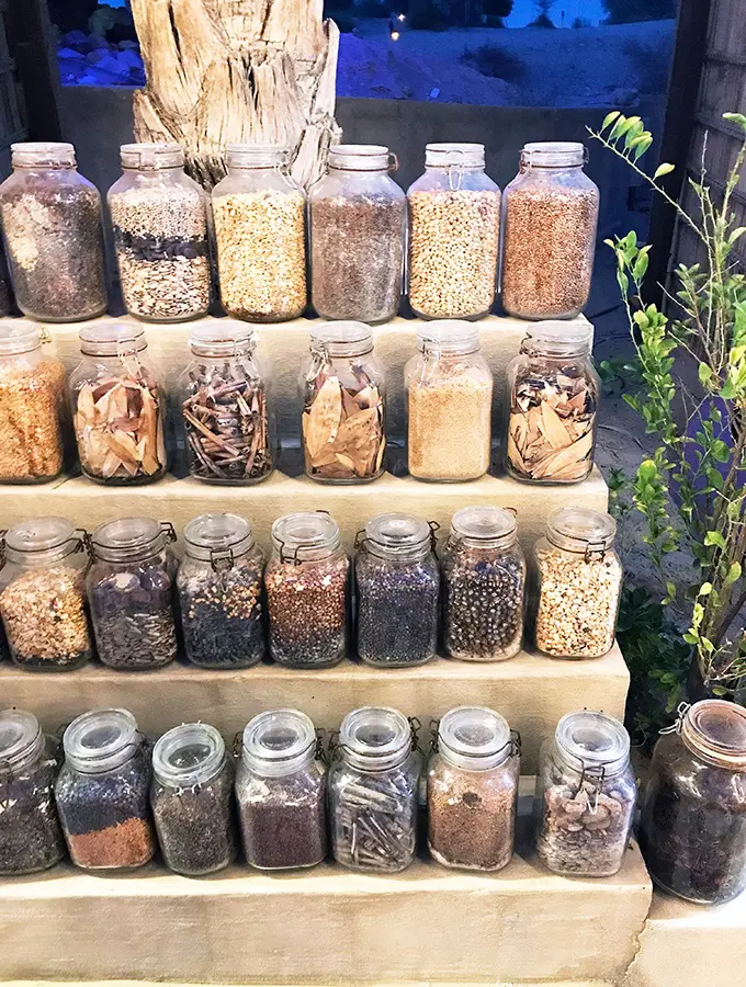 Jars of spices in the souk at Al Hadheerah Desert Restaurant Dubai