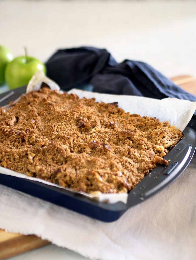 A slice filled with tasty stewed apples - Apple Walnut Crumble Slice