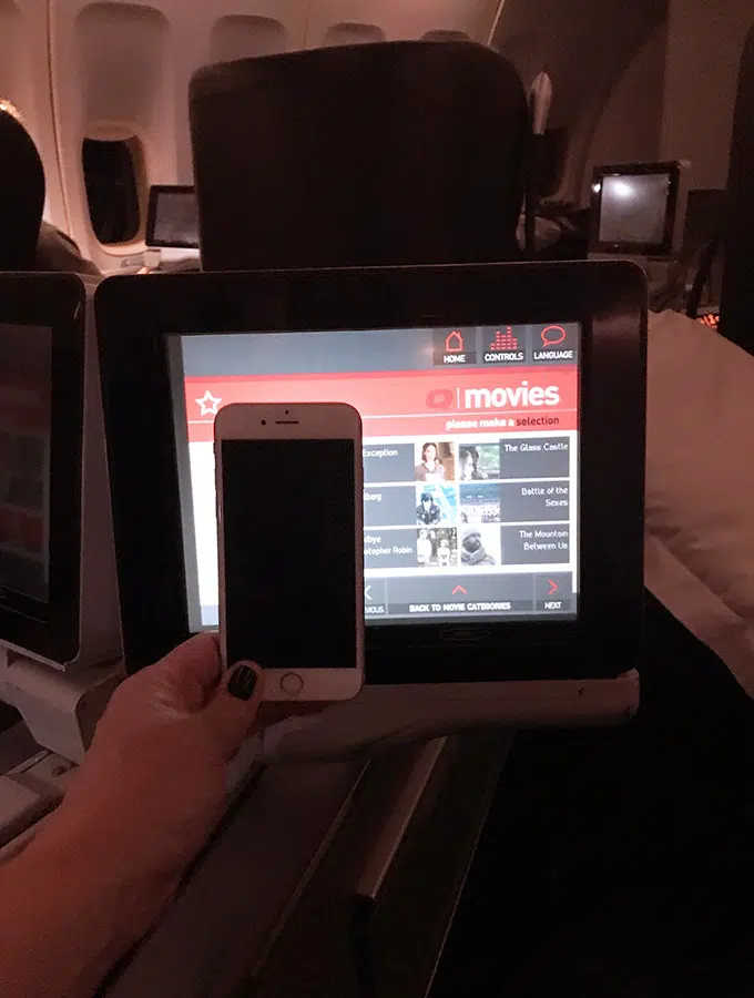 the best Qantas business class seats Sydney to Tokyo - the inflight entertainment unit isn't much bigger than my iPhone plus