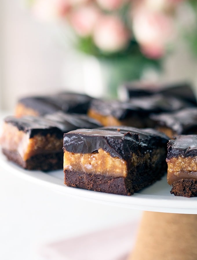 Caramel Crunch Brownies - Simple dark chocolate ganache tops the caramel filling of these chocolate caramel brownies.