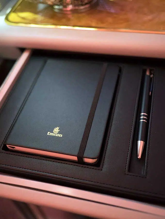 Emirates First Class Sydney to Bangkok note pad and pencil in first class suite