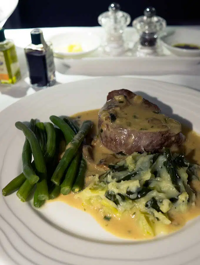 Emirates First Class Sydney to Bangkok eye fillet course with green beans