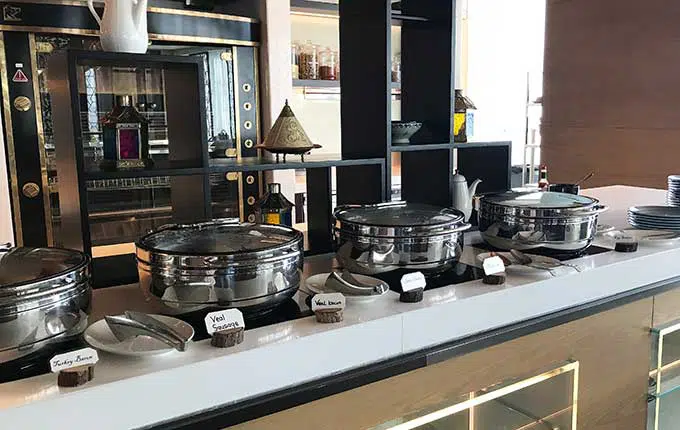 various warm dishes at a cooking station