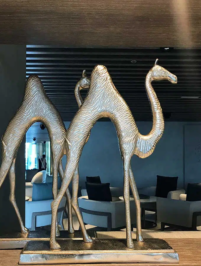 brass camels with long legs