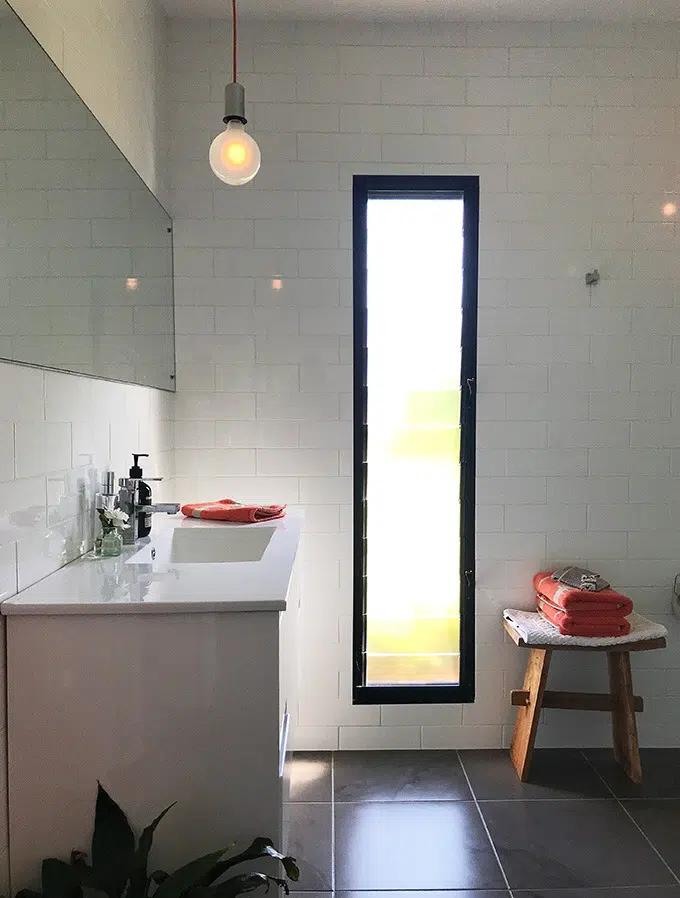 vanity, long window and stool in the bathroom of the dog house port macquarie