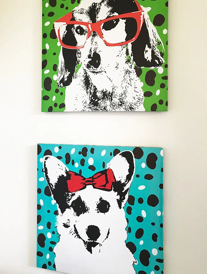 paintings of two dogs in second bedroom at the dog house port macquarie