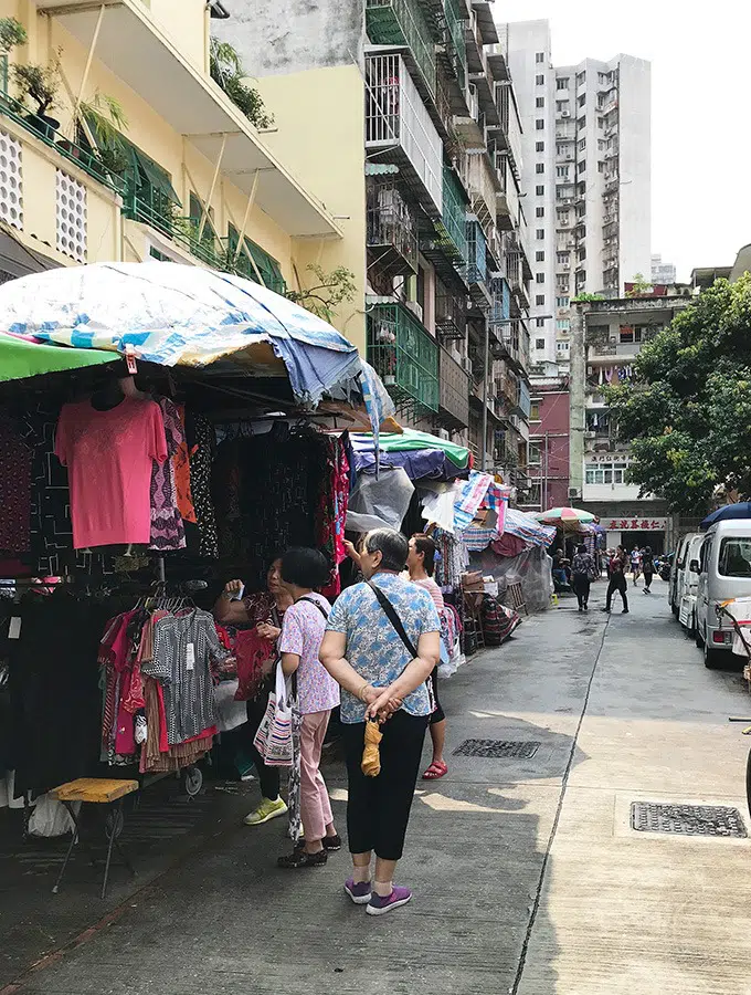 clothing stands outside of the red market macao