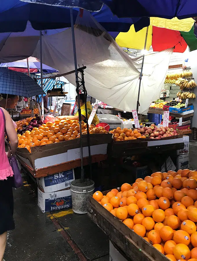oranges being sold at the outside market at the red market macao