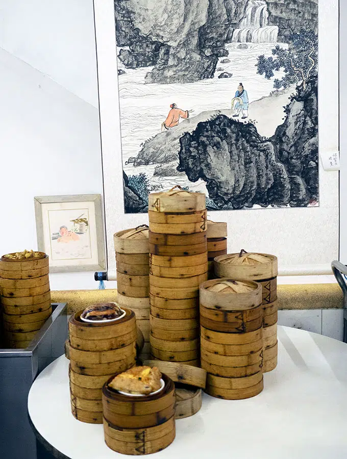 Long Va Tea House in Macao - dim sum baskets stacked on a table