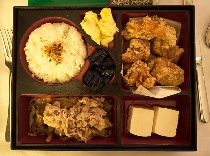 bento box with chicken rice and tofu