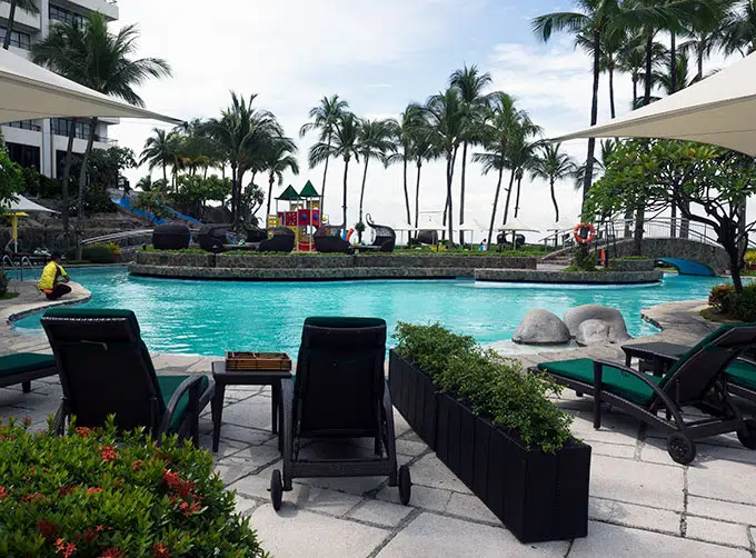 loungers by the pool at Sofitel Philippine Plaza Manila
