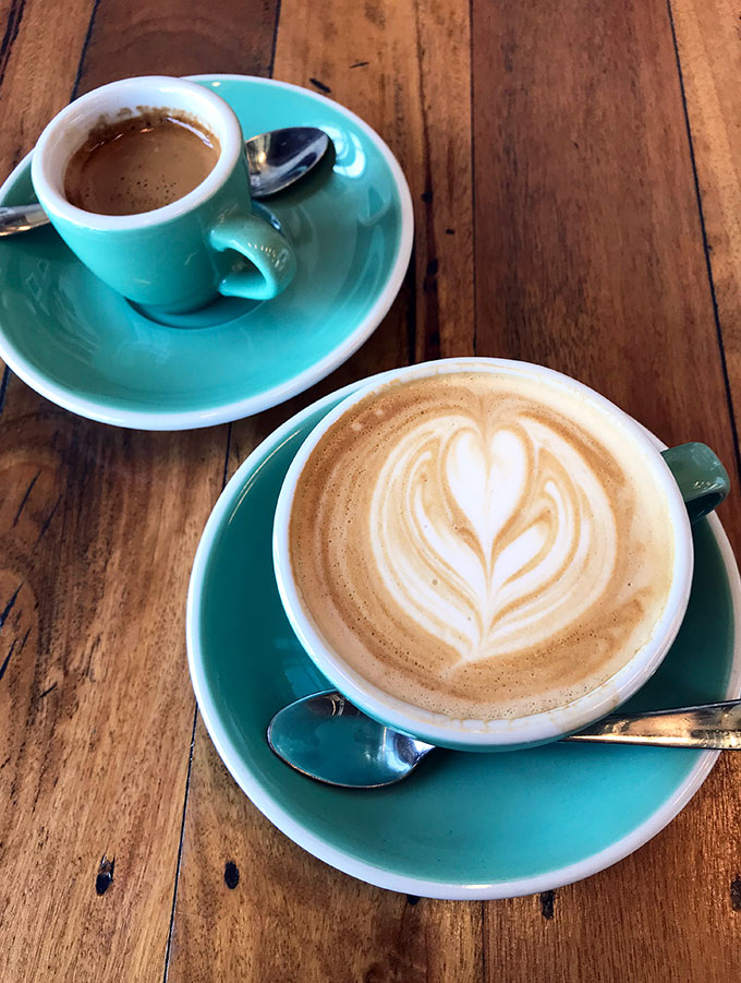latte and espresso in blue cups