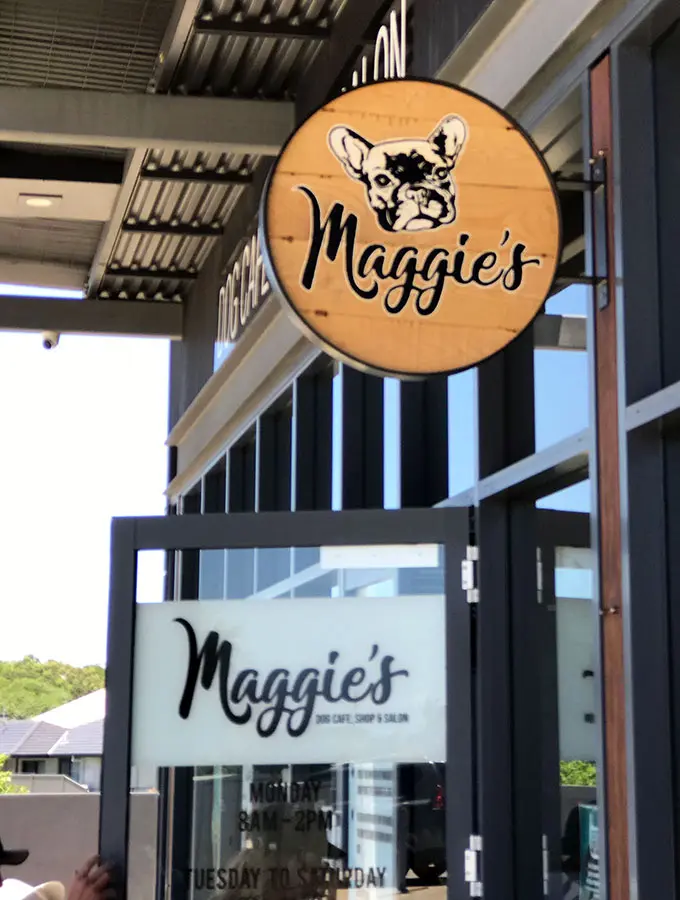 maggies dog cafe sign and entrance door