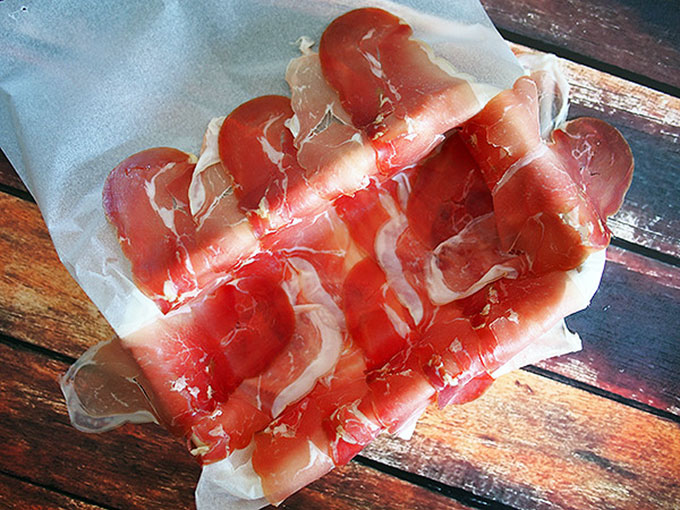 baking tin lined with prosciutto ready for terrine filling