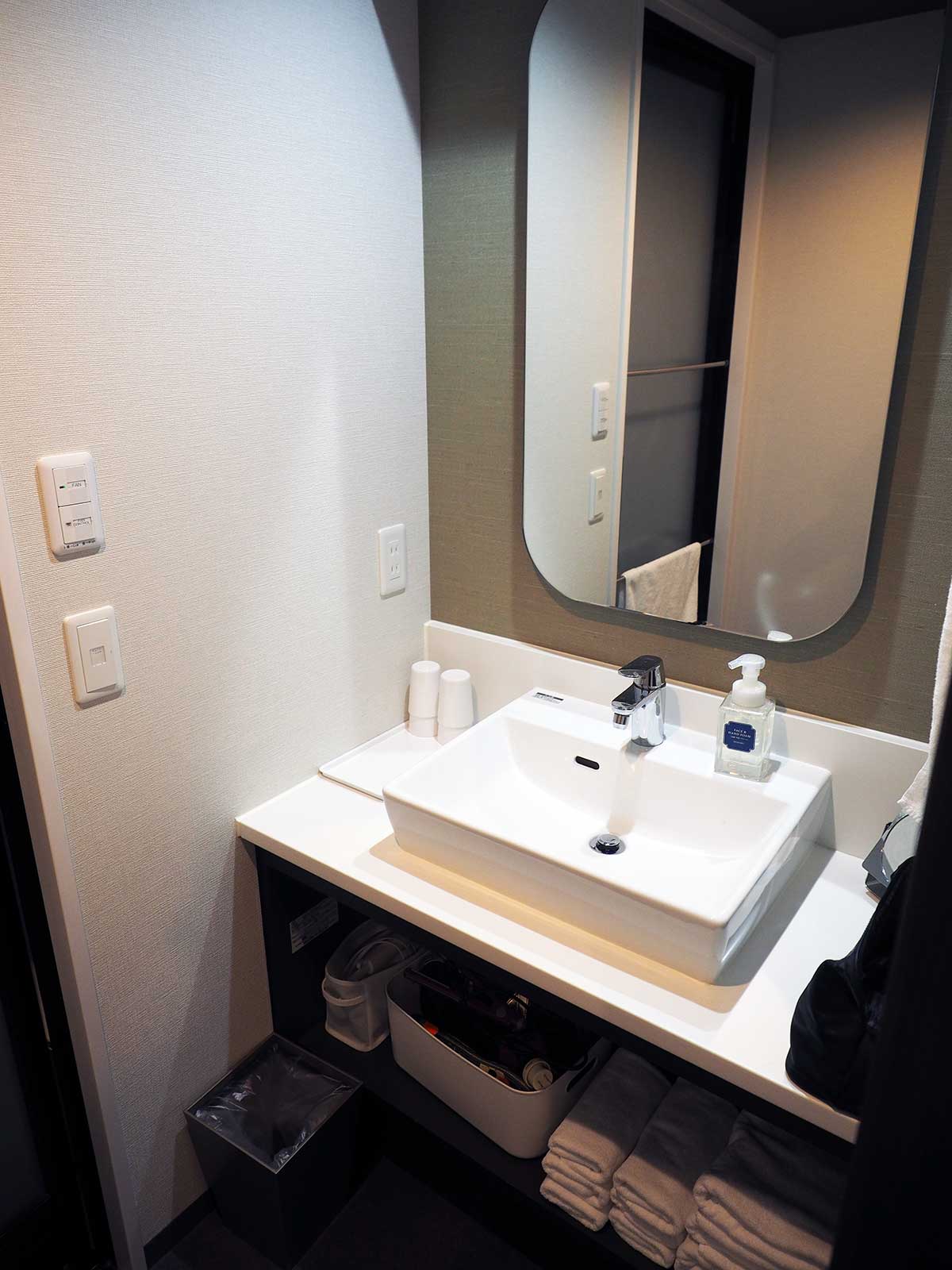 wash basin and mirror in bathroom