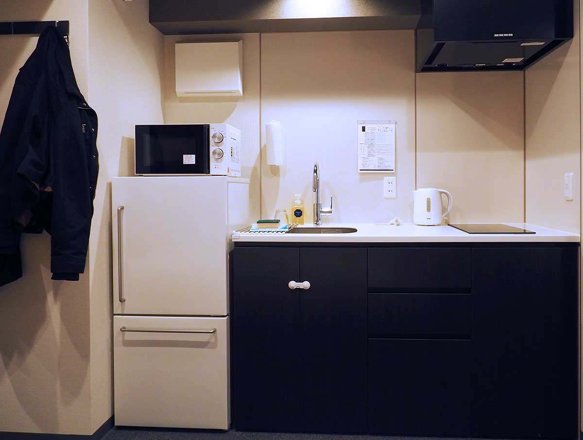 kitchen with fridge and work space