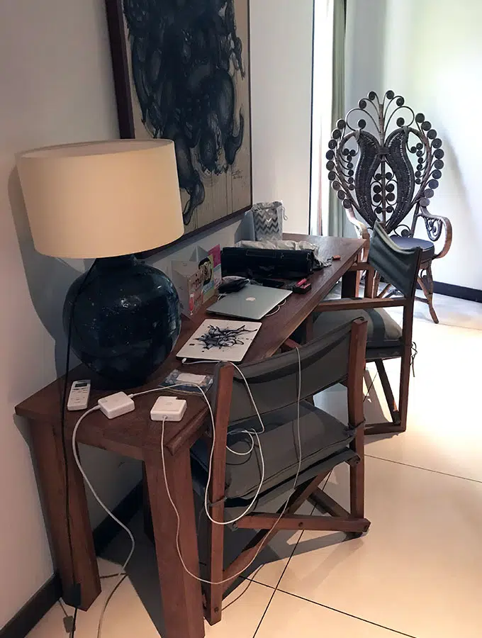 desk with items on it in the main bedroom