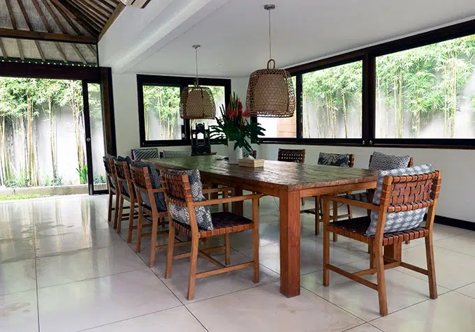 wooden table and chairs in dining area