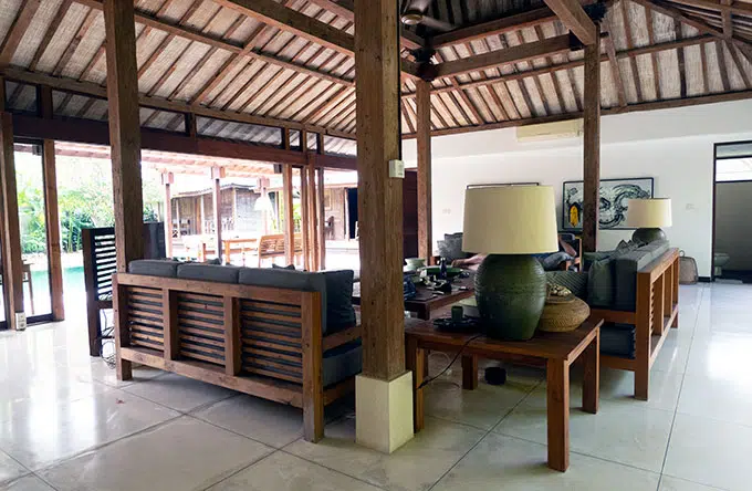 lounge room with wooden furniture at villa amore