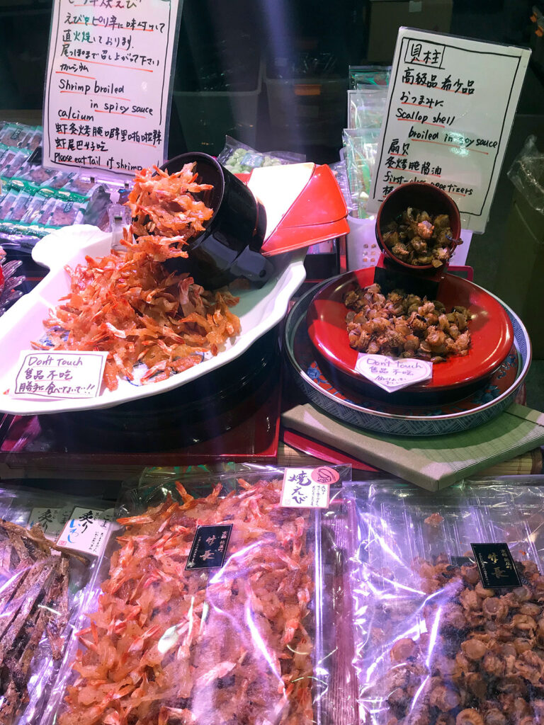 broiled prawns with chili on plates for sale