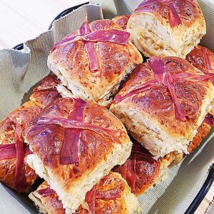 ester buns, savoury hot cross buns in a basket