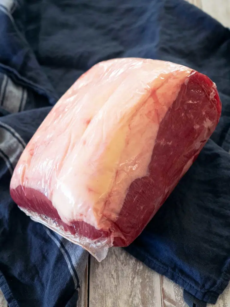 a piece of corned silverside still vacuum sealed from the butcher