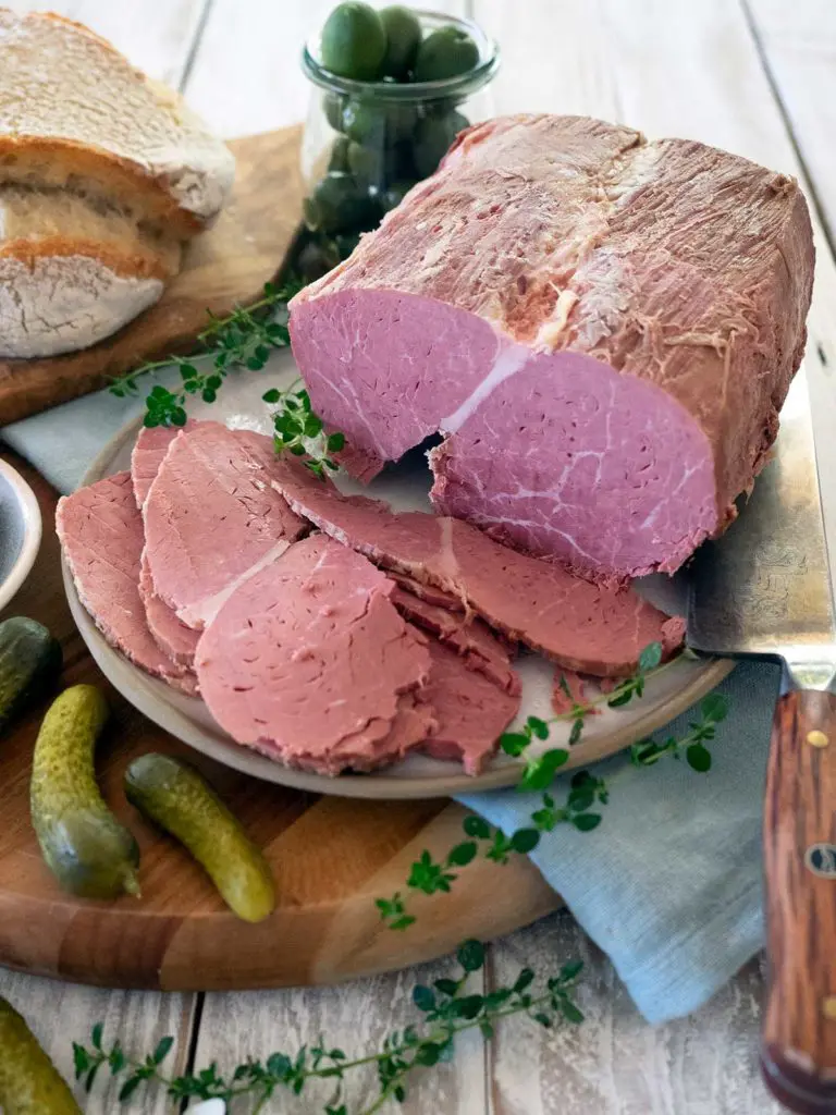 a piece of corned beef with slices